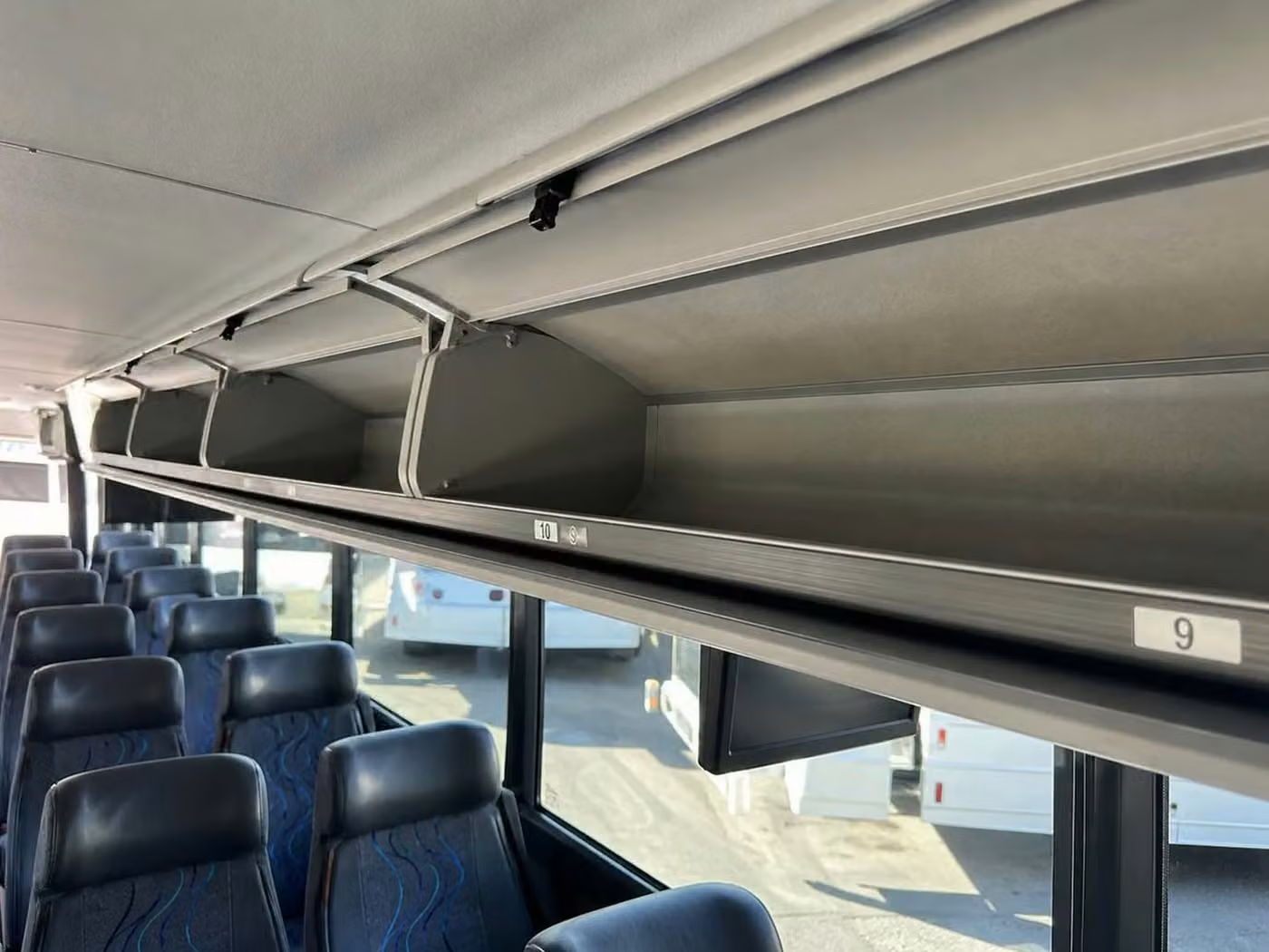 atascadero 25 passenger minibus overhead storage