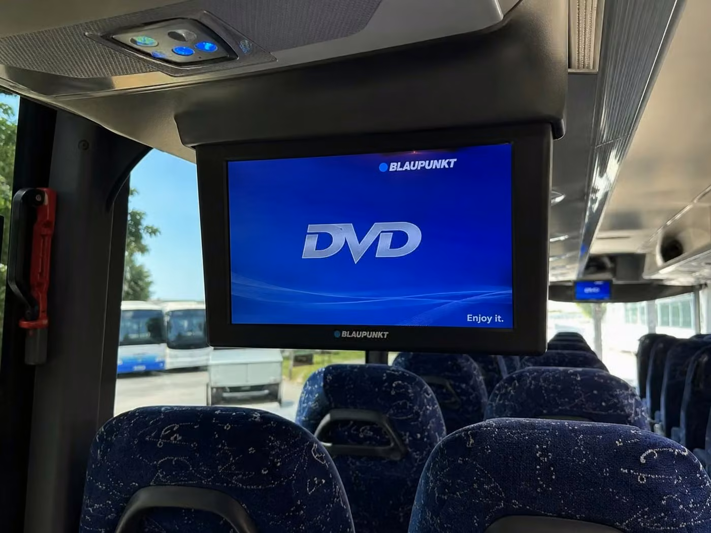 atascadero 56 passenger charter bus tvs